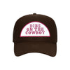 Dibs On The Cowboy trucker hat in espresso brown high-profile foam, front view