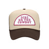 Dibs On The Cowboy trucker hat in tan and brown high-profile foam, front view