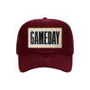 Gameday embroidered patch on a burgundy high-profile foam trucker hat