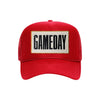 Gameday embroidered patch on a red high-profile foam trucker hat