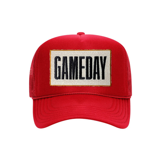 Gameday embroidered patch on a red high-profile foam trucker hat