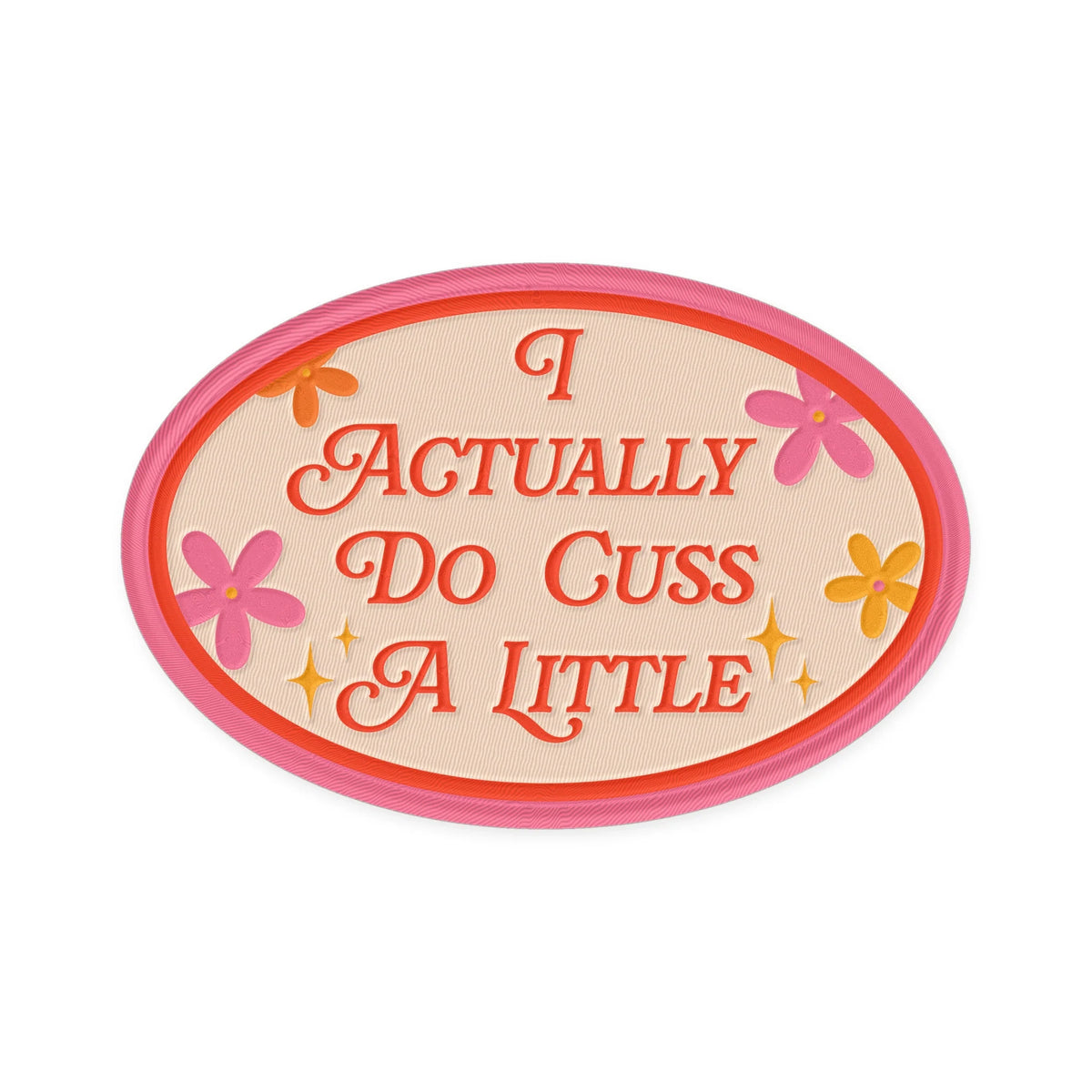 I Actually Do Cuss A Little embroidered iron-on patch, a cream oval with hot pink border, red retro script and daisies on a plain white background