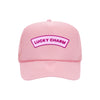 Lucky Charm trucker hat in soft pink high-profile foam, front view