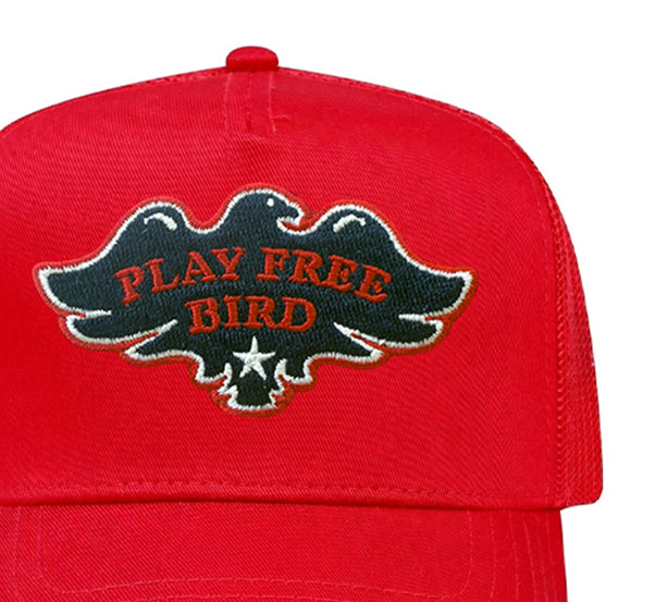 Play Free Bird trucker hat in red, close-up of patch