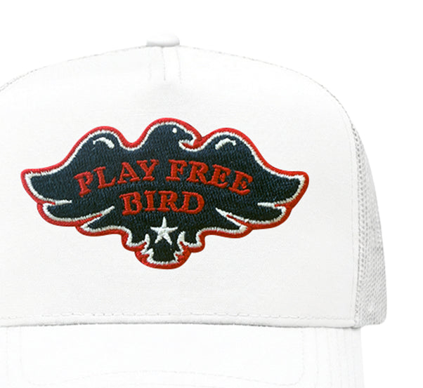 Play Free Bird trucker hat in white, close-up of patch
