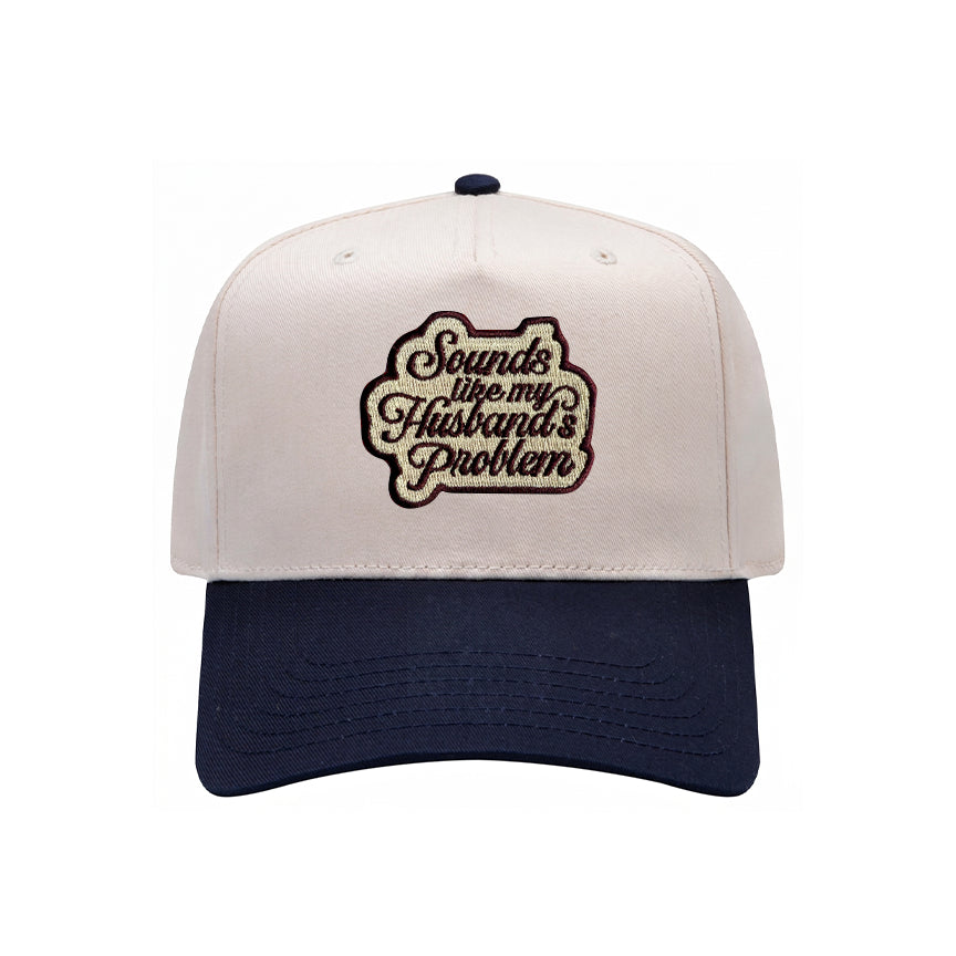 Sounds Like My Husband's Problem trucker hat in navy with natural mesh, front view