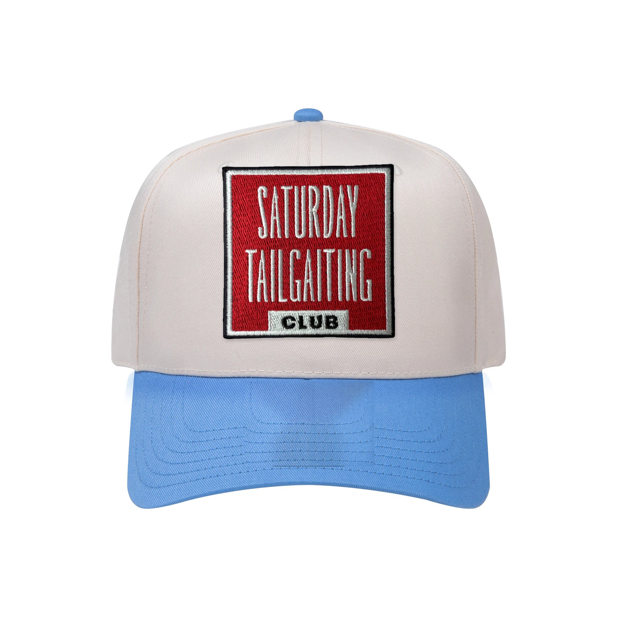 Saturday Tailgating Club embroidered patch on a natural and cobalt blue mid-profile baseball hat
