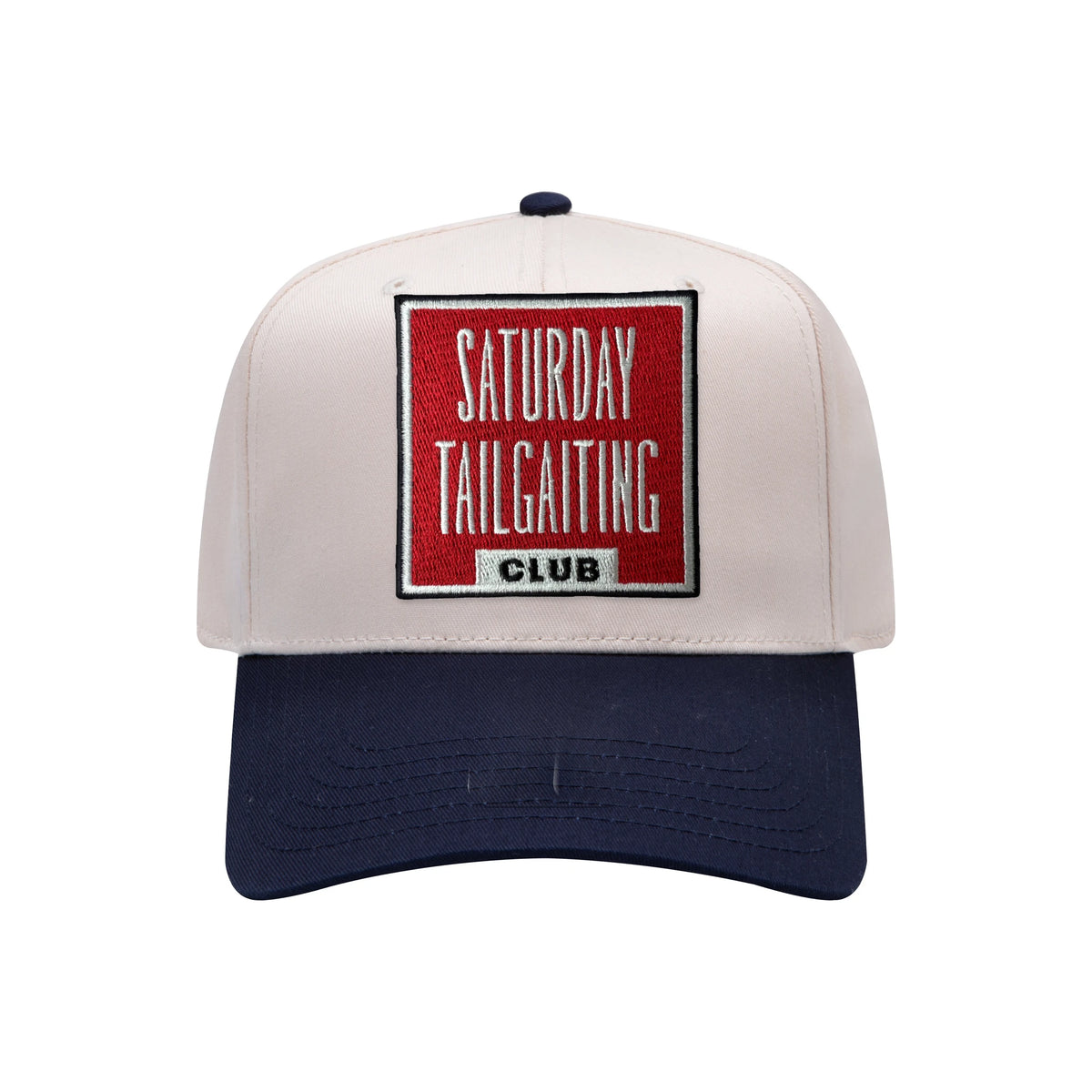 Saturday Tailgating Club embroidered patch on a natural and navy mid-profile baseball hat