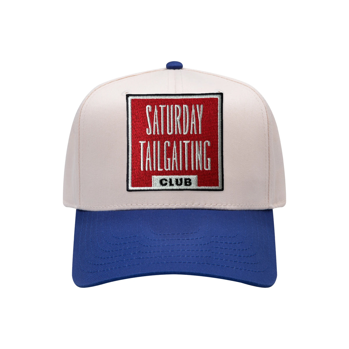 Saturday Tailgating Club embroidered patch on a natural and royal blue mid-profile baseball hat