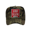 Saturday Tailgating Club embroidered patch on a camouflage high-profile foam trucker hat