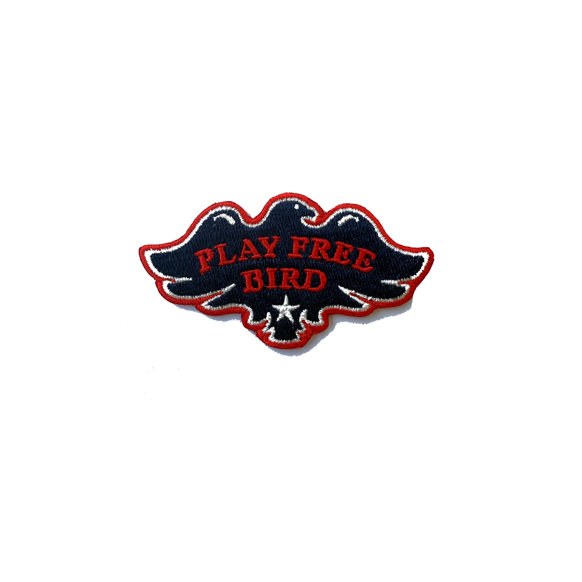 Play Free Bird embroidered iron-on patch with eagle design and red lettering on navy background